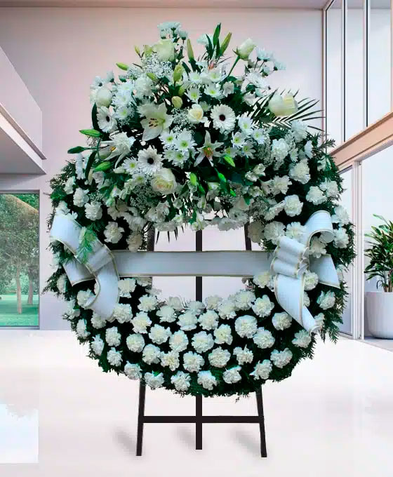Corona Funeraria de claveles blancos para Otazu